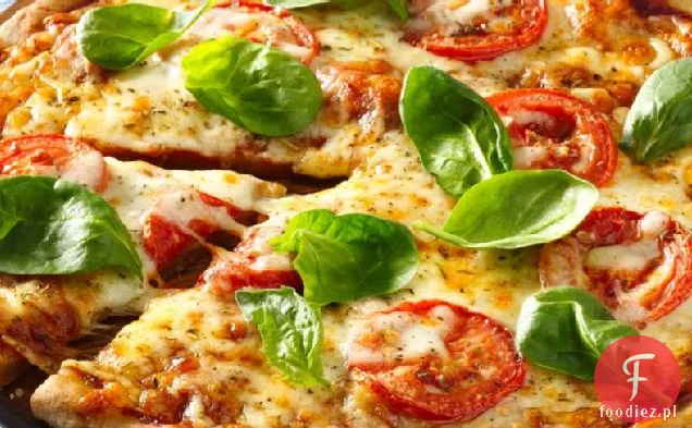 Bezglutenowa pizza z pomidorami i mozzarellą