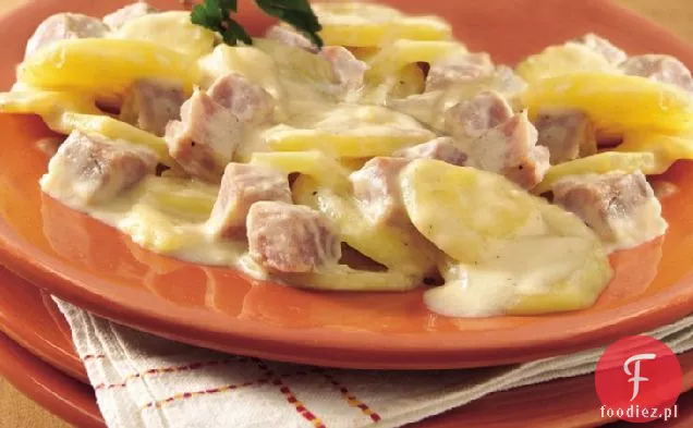 Serowe Ziemniaki zapiekane z szynką