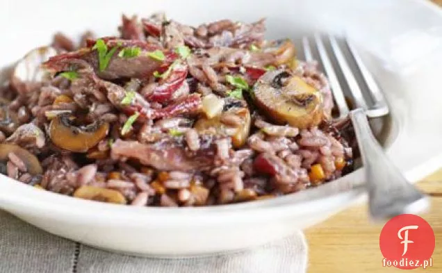 Czerwone wino risotto z kaczką i grzybami garlickimi