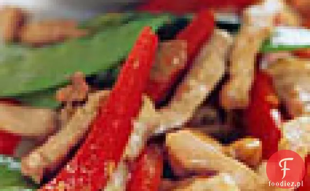Pikantna wieprzowina i nerkowca Stir-Fry z groszkiem śnieżnym i czerwoną papryką