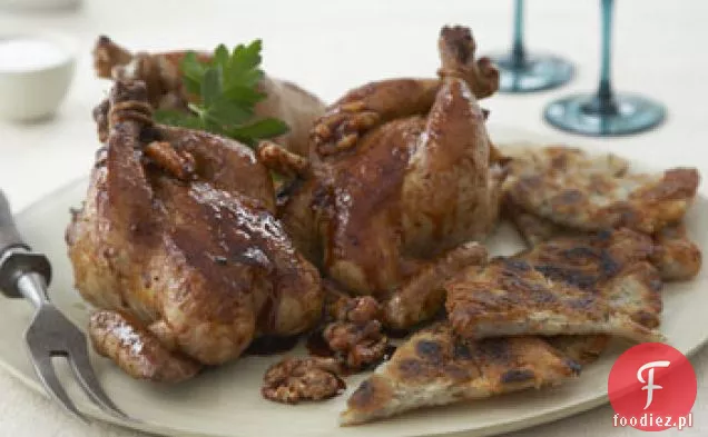 Pieczone Poussins z sosem granatowym i ziemniaczanym Rösti