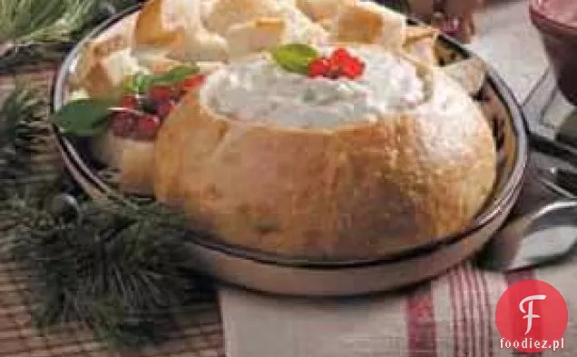 Fondue z małży w misce na chleb
