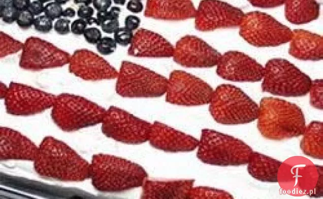 Ciastko z czerwonymi, białymi i niebieskimi truskawkami