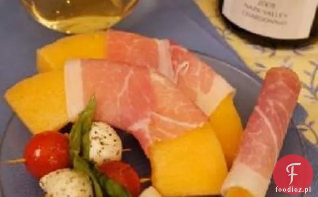 Melon zawinięty w Prosciutto i paluszki chlebowe