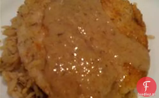 Tilapia parmezanu z sosem z białego wina