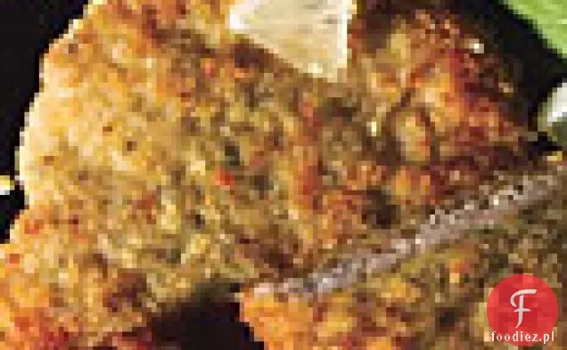 Chrupiące kotlety wieprzowe z kaparami, cytryną, rukolą i posiekanymi jajkami